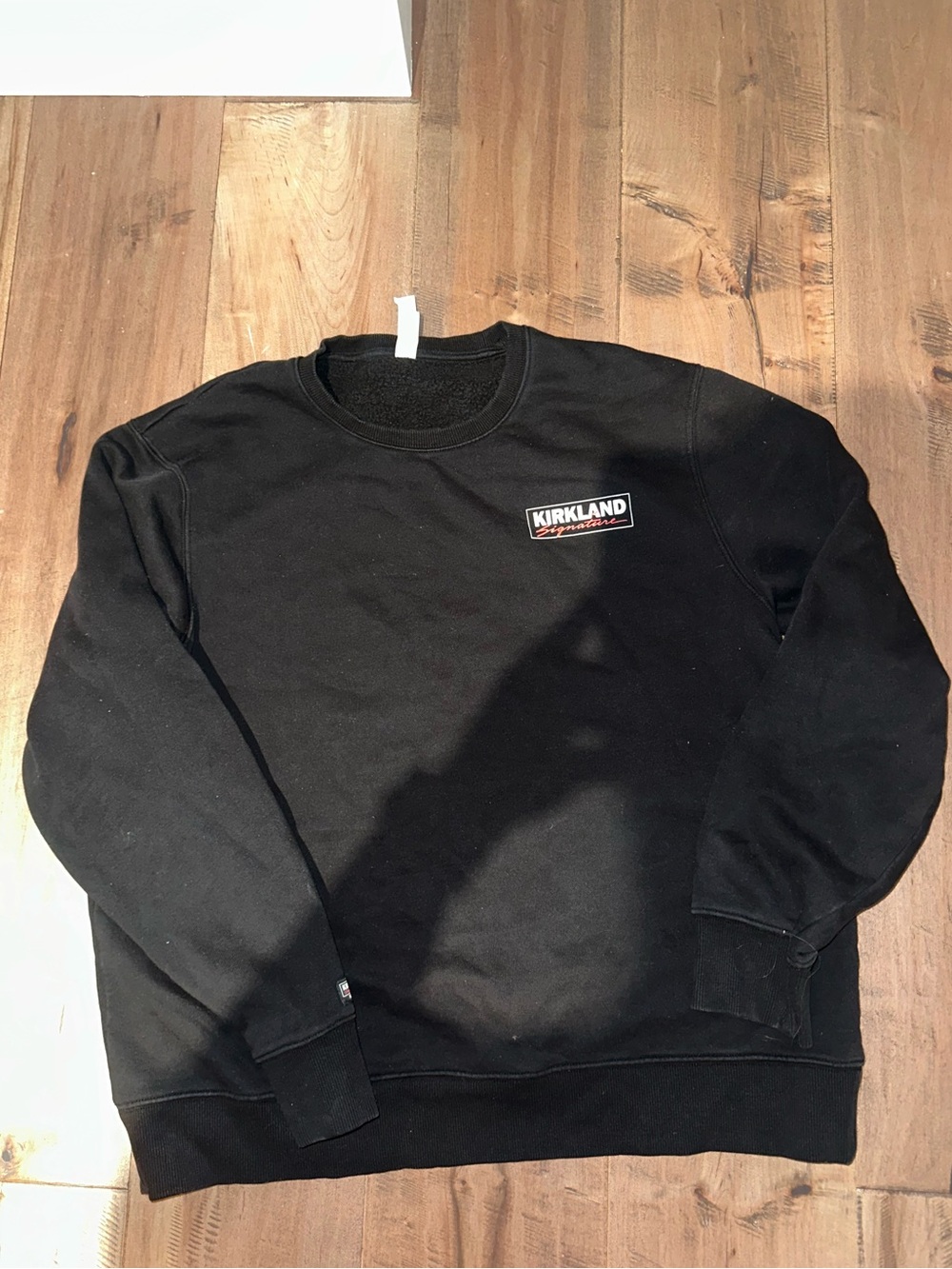 Kirkland Signature Black Crewneck Sweatshirt with Logo Patch